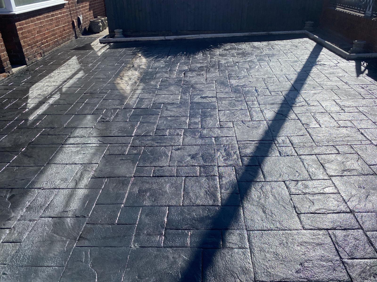 Imprinted concrete driveway after Hedgeway laid it