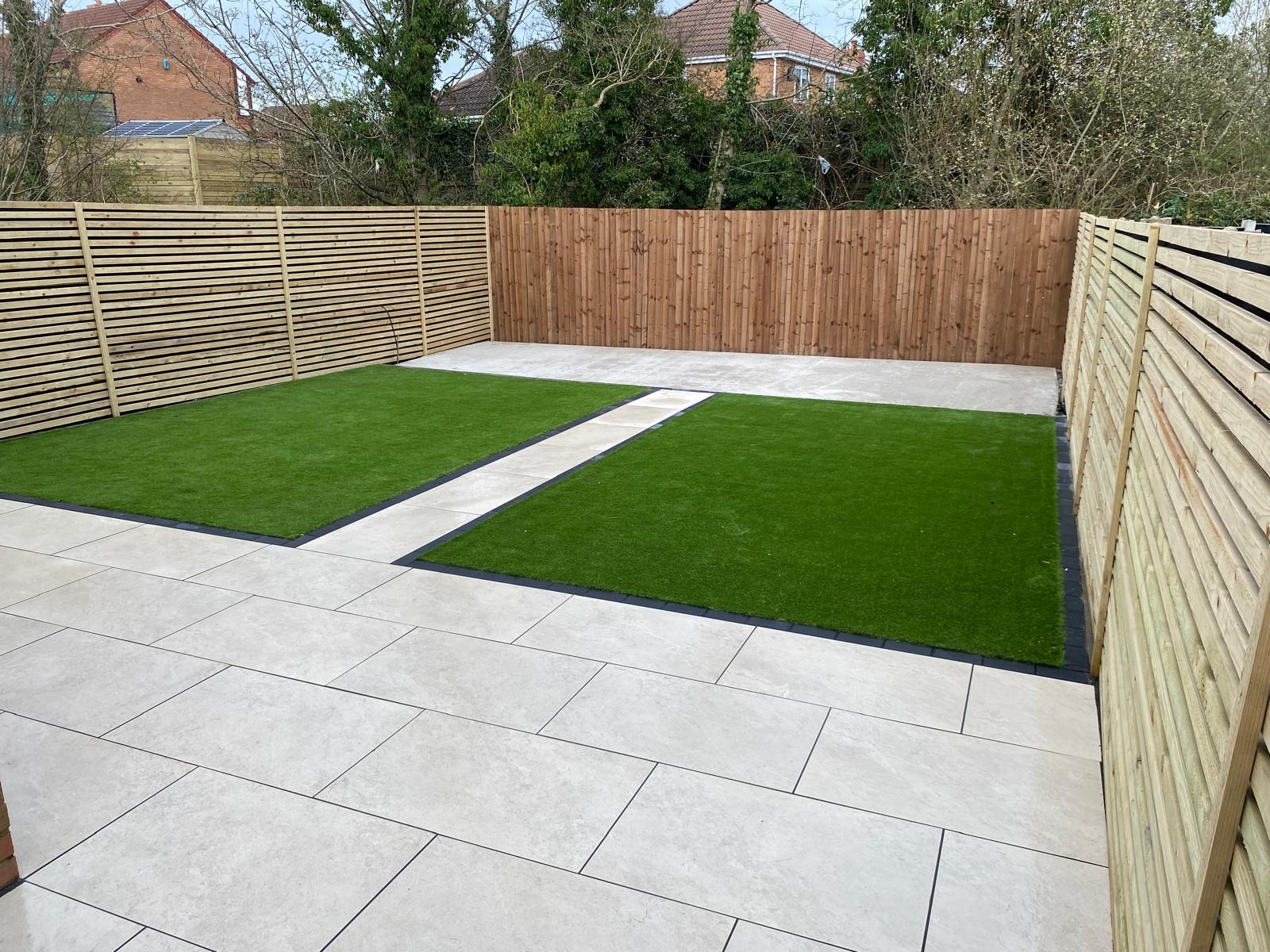 Porcelain patio with artificial grass after Hedgeway transformed the garden