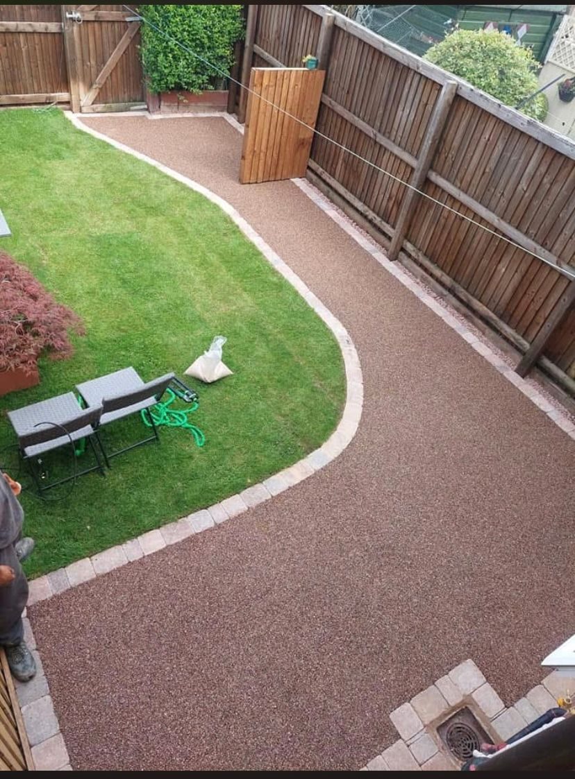 Full back garden transformation with resin path, lawn and fencing by Hedgeway Paving in Preston