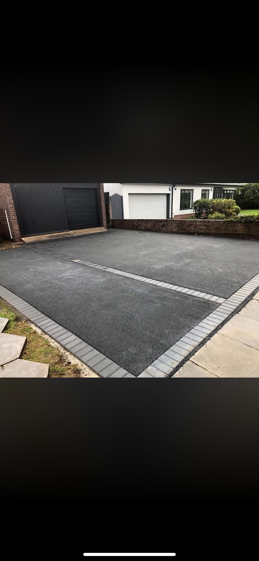 Large tarmac driveway with grey block paving border by Hedgeway Paving in Lancashire